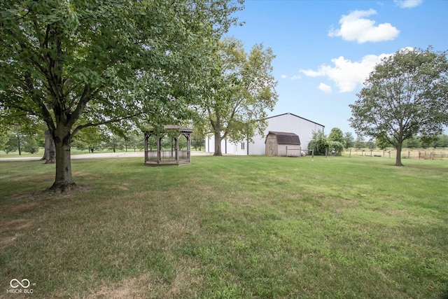5538 N 700 W, Mccordsville, IN 46055 - view of grassy yard with a barn and an outbuilding