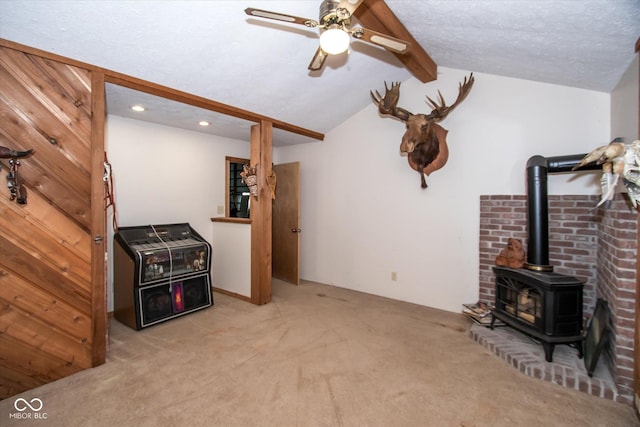 5538 N 700 W, Mccordsville, IN 46055 - unfurnished living room featuring a wood stove, carpet floors, a ceiling fan, and recessed lighting