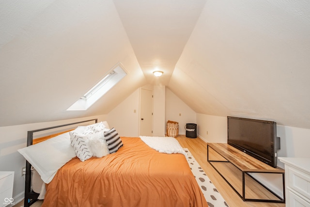 4491 W 600 N, Anderson, IN 46011 - bedroom featuring wood finished floors, lofted ceiling, and a skylight