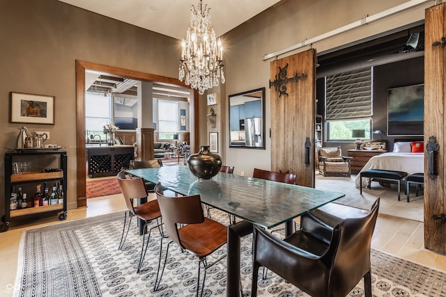 3959 Central Ave, Indianapolis, IN 46205 - dining room with plenty of natural light, a chandelier, and wood finished floors