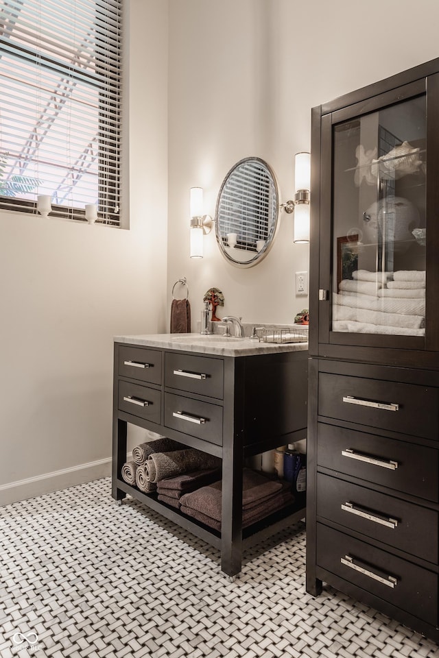 3959 Central Ave, Indianapolis, IN 46205 - bathroom featuring baseboards and vanity