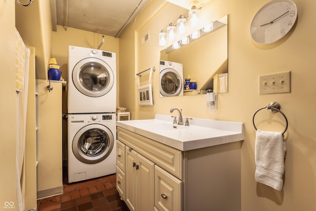 3959 Central Ave, Indianapolis, IN 46205 - laundry room with stacked washer and clothes dryer