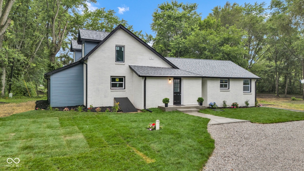 1805 Center Valley Rd, Martinsville, IN 46151 - view of front of property featuring a front yard, roof with shingles, and brick siding