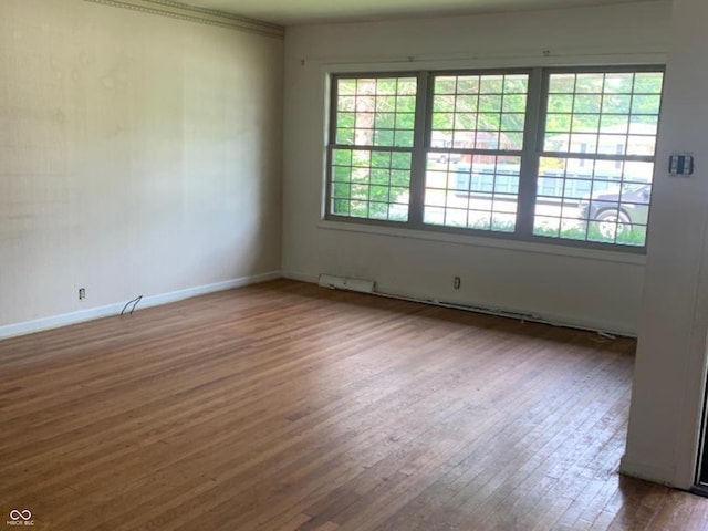 24 David Dr, North Vernon, IN 47265 - unfurnished room featuring wood-type flooring and baseboards