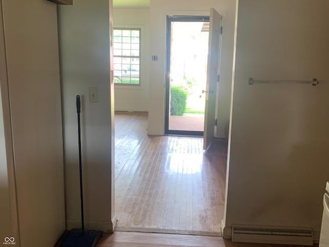 24 David Dr, North Vernon, IN 47265 - corridor featuring hardwood / wood-style flooring and a baseboard radiator