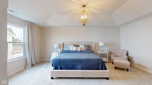 16551 Branham Dr, Fishers, IN 46040 - carpeted bedroom featuring a raised ceiling and a chandelier