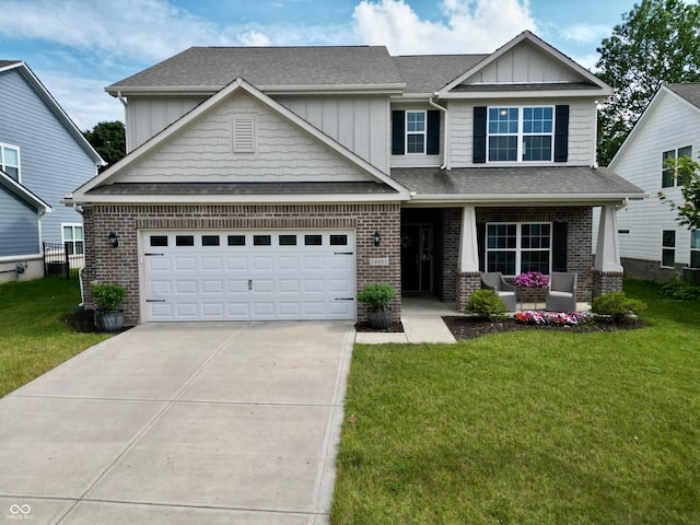 16551 Branham Dr, Fishers, IN 46040 - craftsman-style home with a porch, driveway, a front yard, brick siding, and a shingled roof