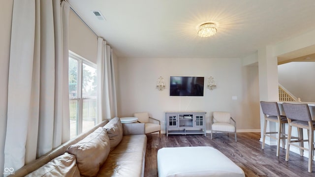 16551 Branham Dr, Fishers, IN 46040 - living area with wood finished floors and stairs