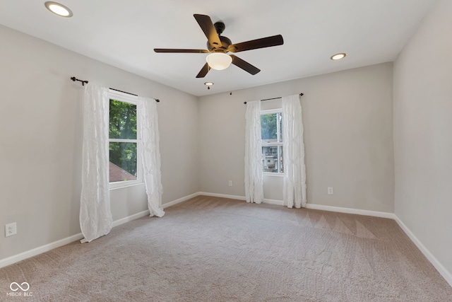 953 E 34th St, Indianapolis, IN 46205 - spare room featuring a ceiling fan, carpet flooring, and recessed lighting