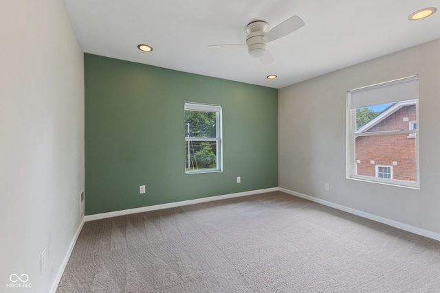 953 E 34th St, Indianapolis, IN 46205 - empty room with a ceiling fan, plenty of natural light, carpet flooring, and recessed lighting