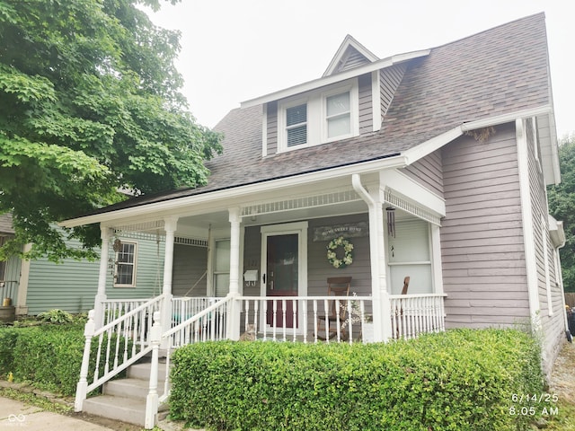 121 N Main St, Pendleton, IN 46064 - view of front facade with roof with shingles and a porch