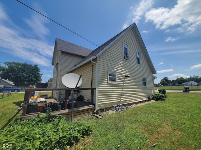 702 W Cross St, Brownstown, IN 47220 - view of property exterior with a lawn and a wooden deck