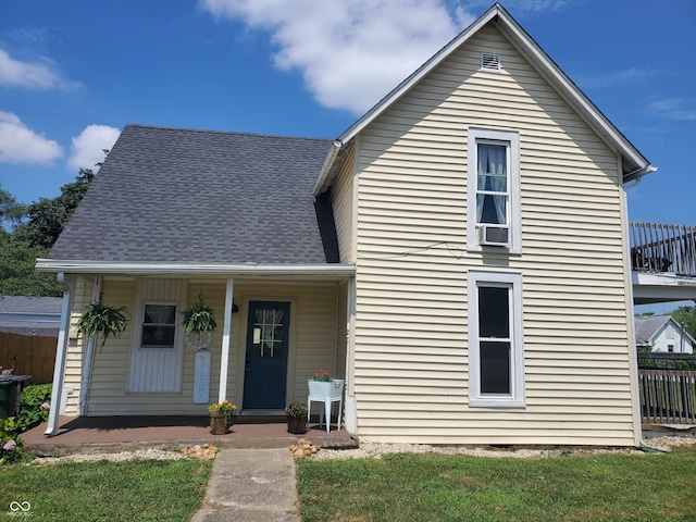 702 W Cross St, Brownstown, IN 47220 - view of front of home with a porch and a shingled roof