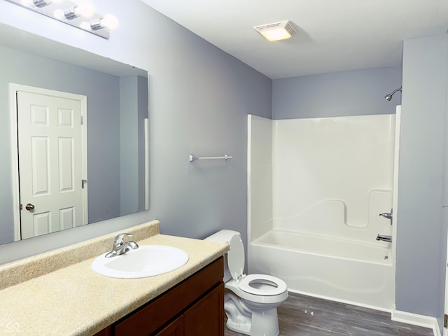 3314 Montgomery Dr, Indianapolis, IN 46227 - bathroom with vanity, tub / shower combination, and wood finished floors