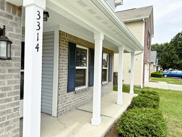 3314 Montgomery Dr, Indianapolis, IN 46227 - view of side of home with a porch and brick siding