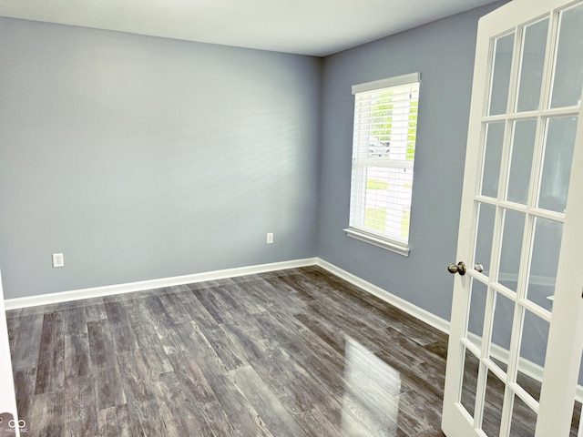 3314 Montgomery Dr, Indianapolis, IN 46227 - unfurnished room with dark wood-style floors and baseboards