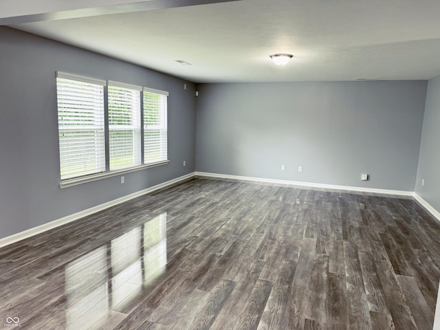 3314 Montgomery Dr, Indianapolis, IN 46227 - unfurnished room featuring dark wood finished floors