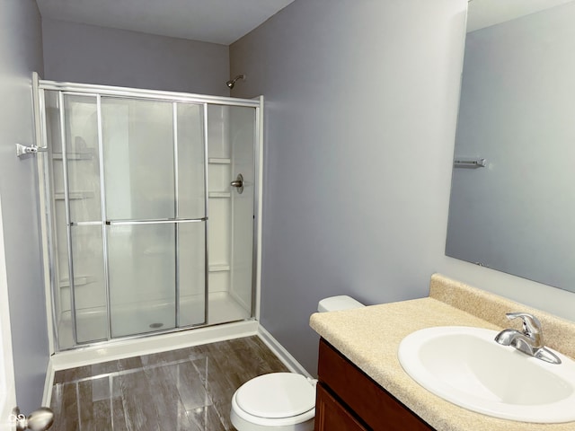 3314 Montgomery Dr, Indianapolis, IN 46227 - bathroom with vanity, a shower with shower door, and wood finished floors
