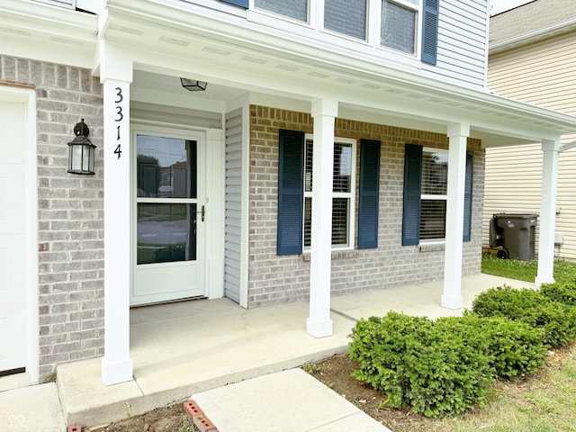 3314 Montgomery Dr, Indianapolis, IN 46227 - view of exterior entry with a porch and brick siding