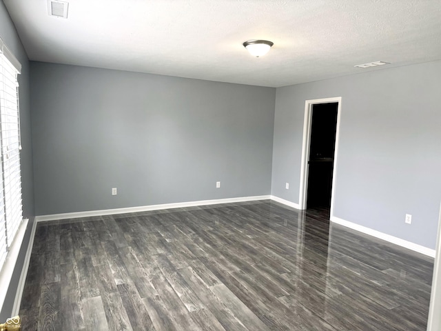 3314 Montgomery Dr, Indianapolis, IN 46227 - unfurnished room with dark wood-type flooring