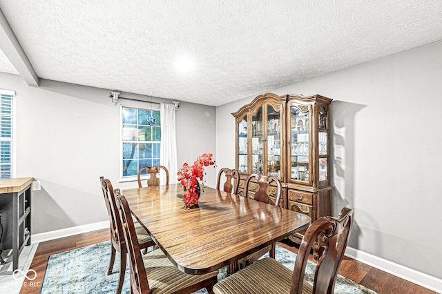 7616 Concord Ln, Fishers, IN 46038 - dining room featuring a textured ceiling and dark wood finished floors