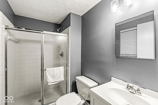7616 Concord Ln, Fishers, IN 46038 - full bathroom featuring vanity, a stall shower, and a textured ceiling