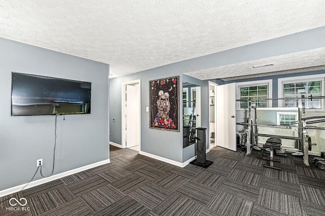 7616 Concord Ln, Fishers, IN 46038 - workout area featuring carpet floors and a textured ceiling