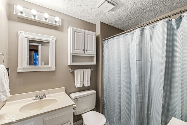7616 Concord Ln, Fishers, IN 46038 - bathroom with vanity, a textured ceiling, and a shower with curtain
