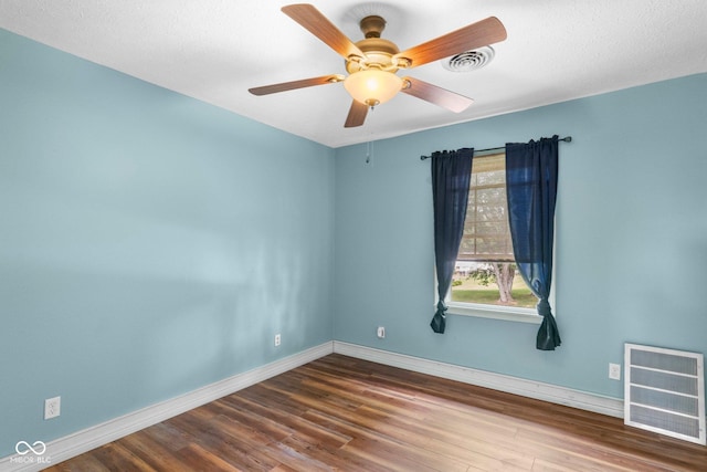 925 W Hancock Rd, Scottsburg, IN 47170 - empty room with wood finished floors and a ceiling fan