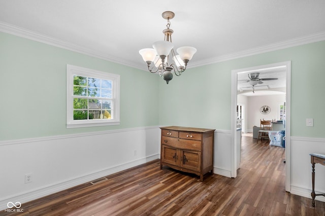 925 W Hancock Rd, Scottsburg, IN 47170 - spare room featuring a chandelier, dark wood-style flooring, ornamental molding, and ceiling fan