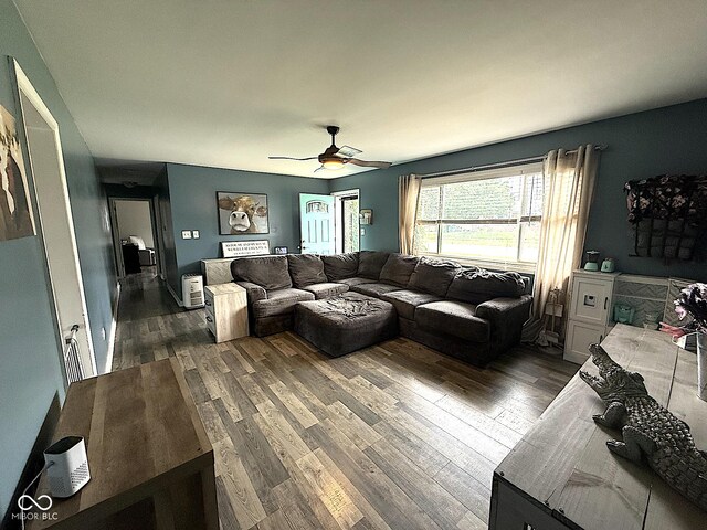729 Maple Ln, Brownsburg, IN 46112 - living area featuring ceiling fan and dark wood finished floors