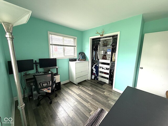 729 Maple Ln, Brownsburg, IN 46112 - home office featuring dark wood finished floors and baseboards