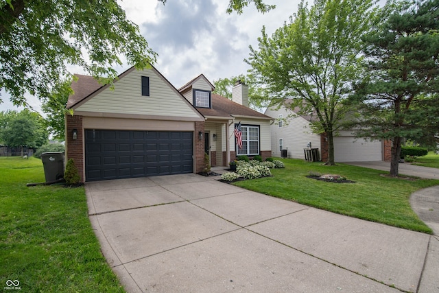 4238 Victory Ct, Indianapolis, IN 46203 - traditional-style house with brick siding, a front yard, an attached garage, concrete driveway, and a chimney