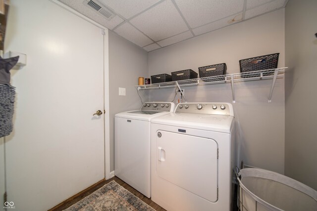 4238 Victory Ct, Indianapolis, IN 46203 - laundry area featuring separate washer and dryer and wood finished floors
