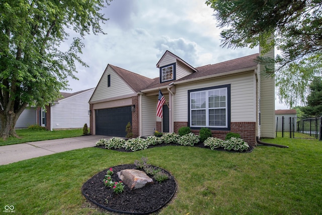 4238 Victory Ct, Indianapolis, IN 46203 - view of front facade with brick siding, concrete driveway, a chimney, and an attached garage