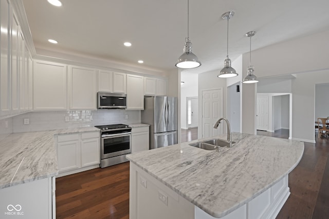 2078 Seneca Ln, Plainfield, IN 46168 - kitchen with stainless steel appliances, white cabinets, backsplash, and recessed lighting