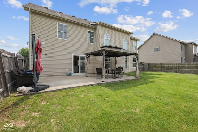 2078 Seneca Ln, Plainfield, IN 46168 - back of property with a patio area, a fenced backyard, and a gazebo