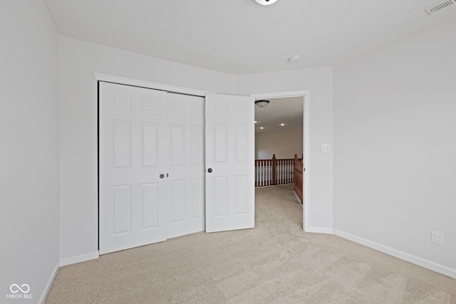 2078 Seneca Ln, Plainfield, IN 46168 - unfurnished bedroom featuring carpet floors and a closet