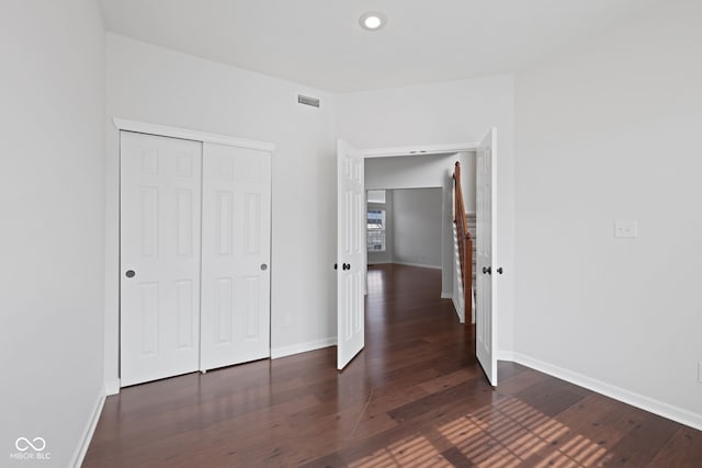 2078 Seneca Ln, Plainfield, IN 46168 - unfurnished bedroom with wood finished floors, a closet, and recessed lighting