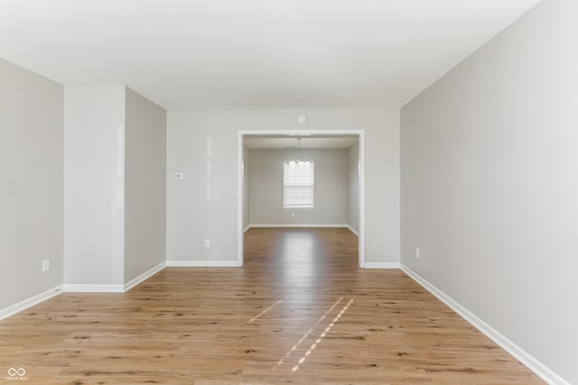 413 Youngs Creek Ct, Franklin, IN 46131 - empty room with light wood finished floors and baseboards