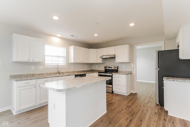 413 Youngs Creek Ct, Franklin, IN 46131 - kitchen featuring appliances with stainless steel finishes, under cabinet range hood, white cabinetry, light countertops, and recessed lighting