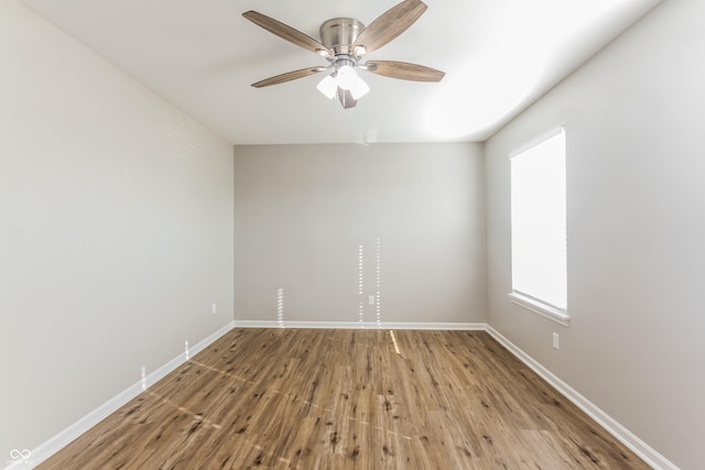 413 Youngs Creek Ct, Franklin, IN 46131 - unfurnished room with wood finished floors and a ceiling fan