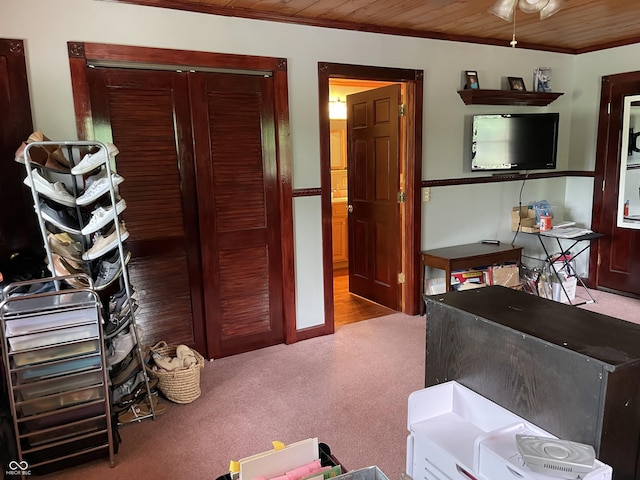14380 N 300 E, Covington, IN 47932 - carpeted bedroom featuring crown molding, wooden ceiling, and a closet