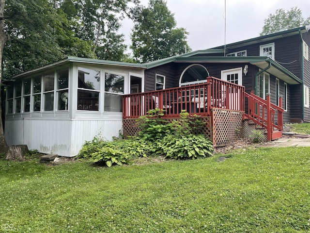 14380 N 300 E, Covington, IN 47932 - back of property with a yard, a sunroom, and a deck
