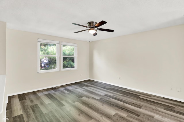 8920 Caminito Rd, Indianapolis, IN 46234 - unfurnished room featuring wood finished floors and a ceiling fan