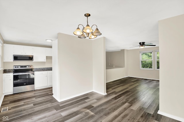8920 Caminito Rd, Indianapolis, IN 46234 - kitchen with appliances with stainless steel finishes, dark wood finished floors, and white cabinets