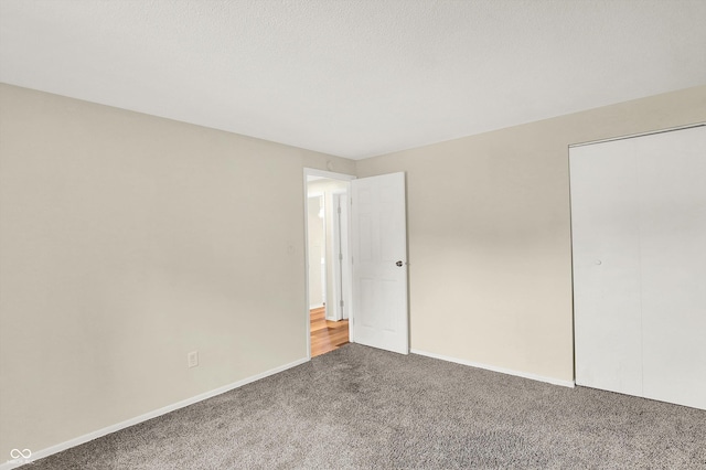 8920 Caminito Rd, Indianapolis, IN 46234 - unfurnished bedroom featuring carpet flooring and baseboards
