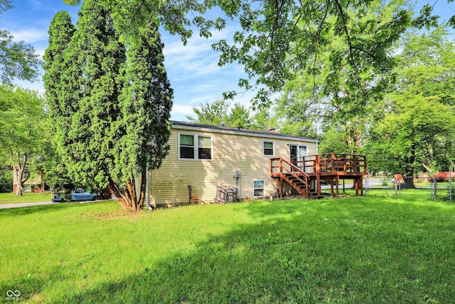 8920 Caminito Rd, Indianapolis, IN 46234 - back of house featuring a deck and stairs