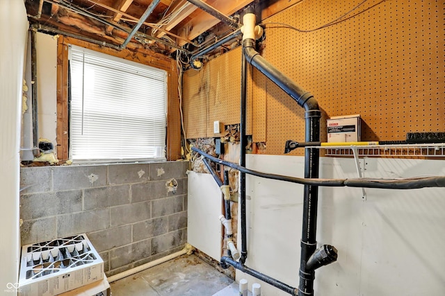 8920 Caminito Rd, Indianapolis, IN 46234 - interior space with concrete block wall and unfinished concrete flooring
