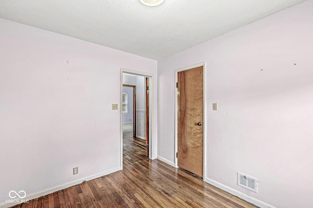 4010 S Bazil Ave, Indianapolis, IN 46239 - empty room with hardwood / wood-style floors